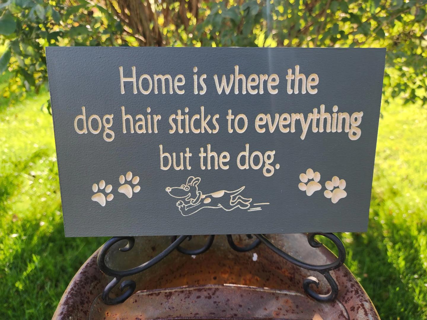 Home is where the dog hair sticks home decor sign.